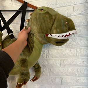 Boys riding dinosaur costume. Great condition! Fits toddler size 4T - 5T.